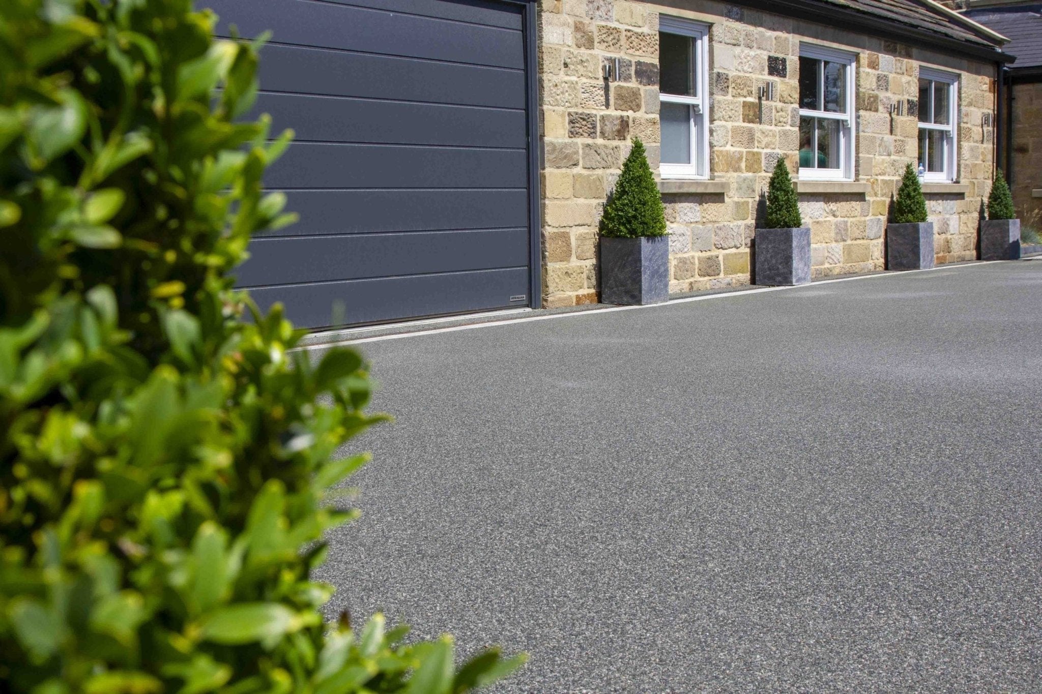 Enhancing a New Build Property with Resin Bound Pathway and Driveway Installation - Resin Mill